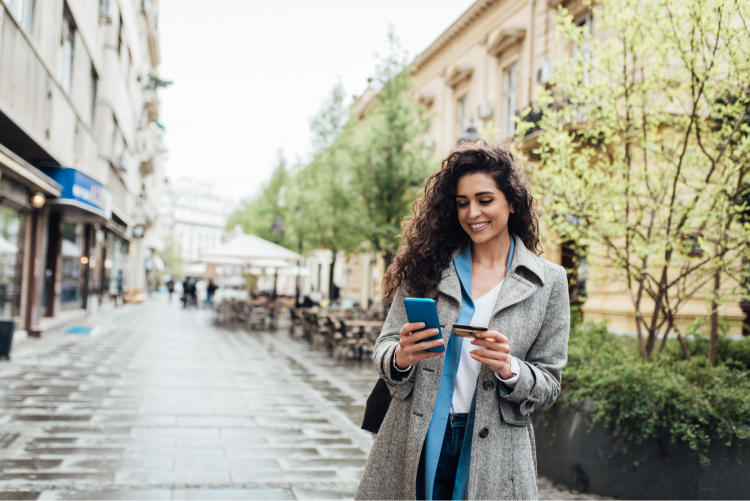 Woman using TCU mobile from the Paris of the Prairies