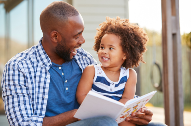 Father and daughter reading